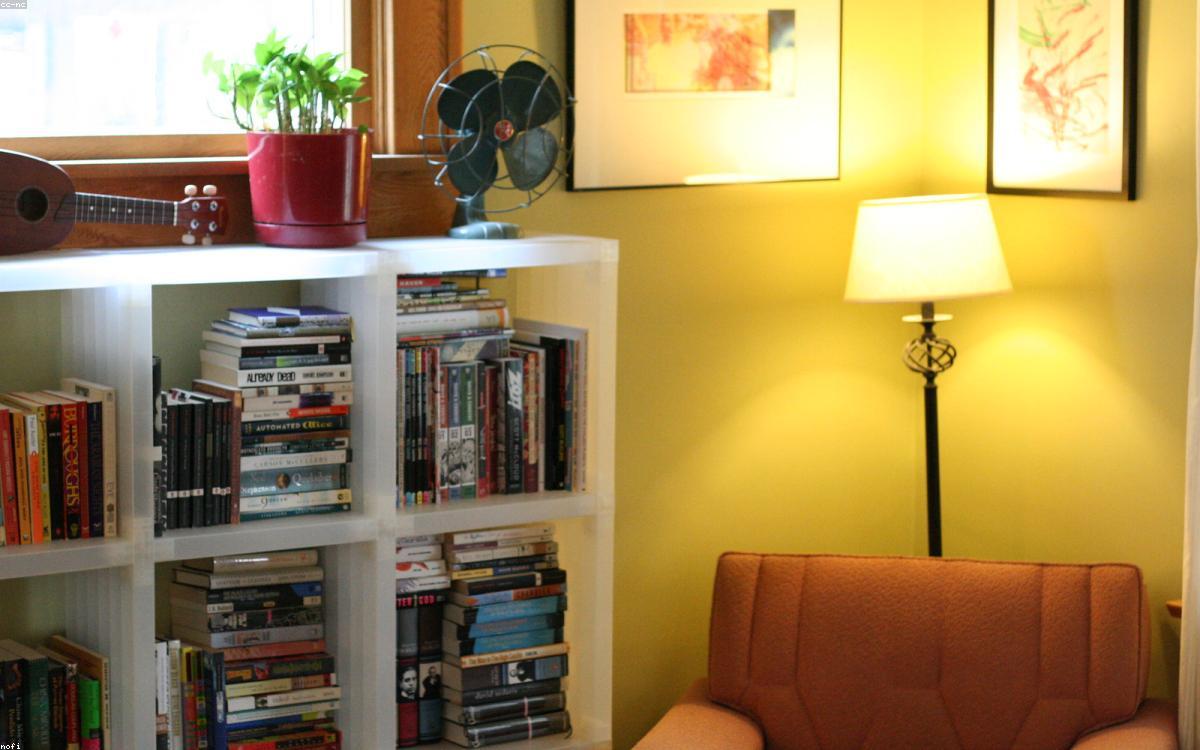 A textured area rug anchoring a cozy living room with a sofa and coffee table